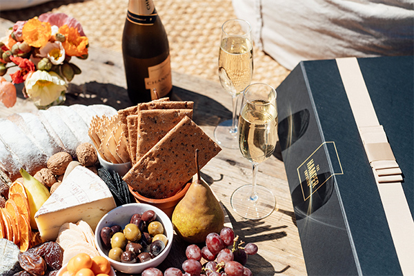 Romantic sparkling wine picnic